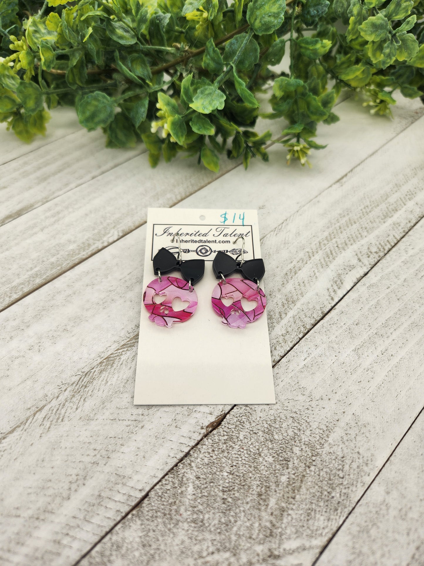 Pink and black skull earrings