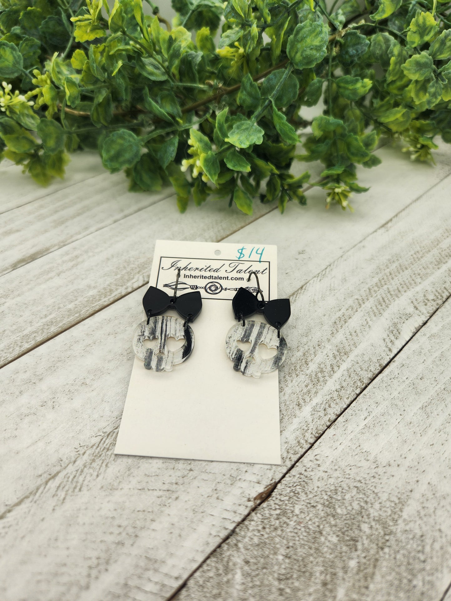 White and black skull earrings