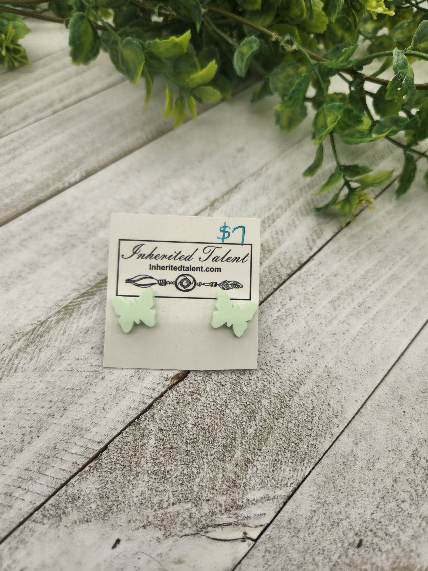 Light green butterfly stud earrings