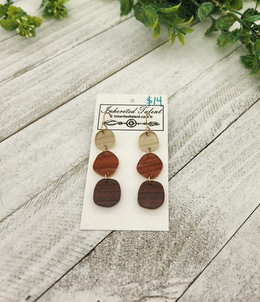 Cream, orange, and brown earrings